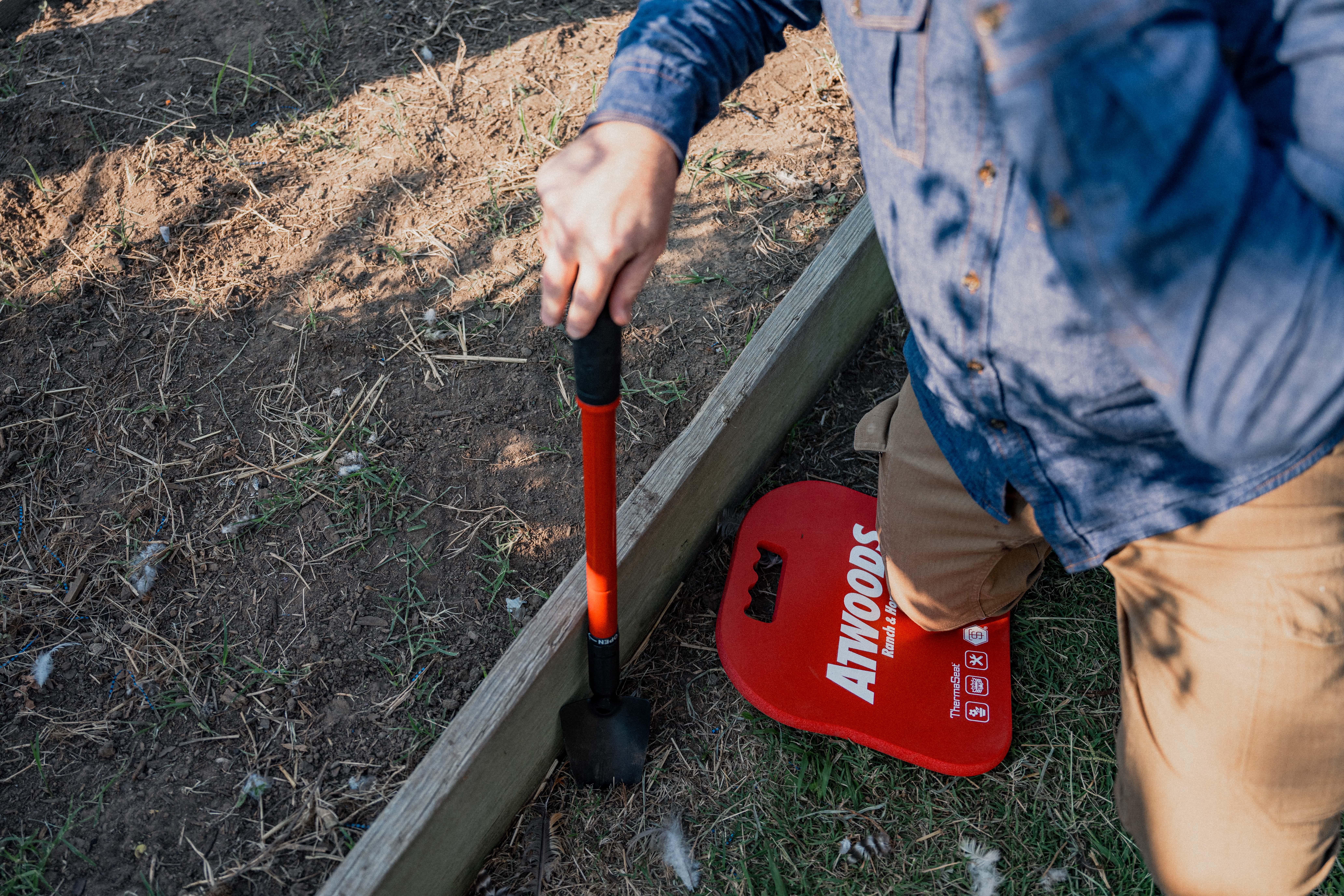 Leaf piles gathered along a driveway